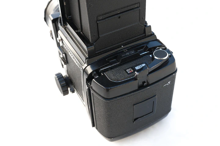 A photo of the back of a Mamiya RB67 showing the film-back in the landscape orientation.