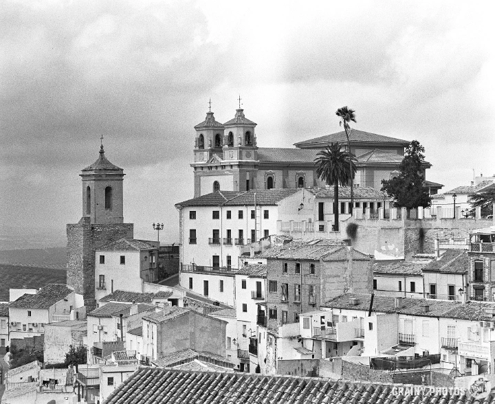A black-and-white photo looking at the old part of Martos.