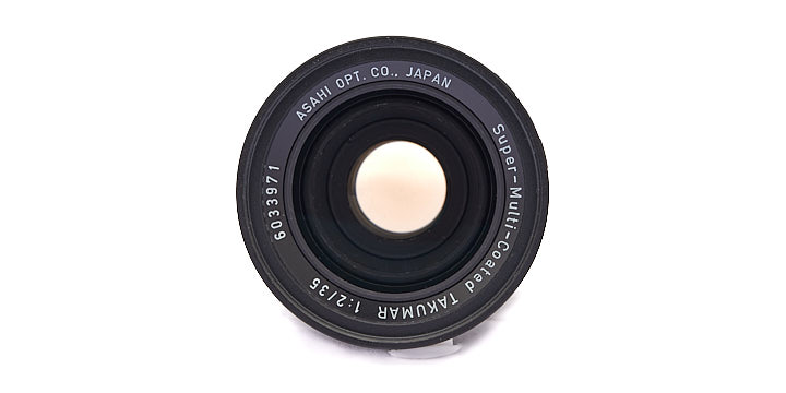 Photo of Super-Takumar 35mm f2 lens viewed from the front.
