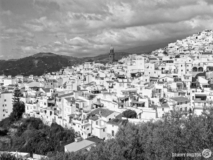 A black-and-white film photo of Competa