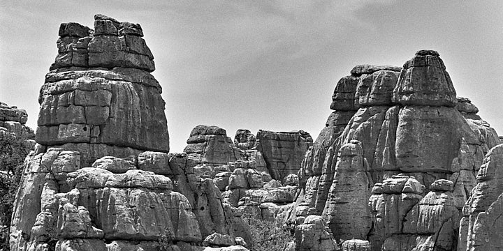 A black-and-white film photo of a Karst rock formation in El Torcal de Antequera