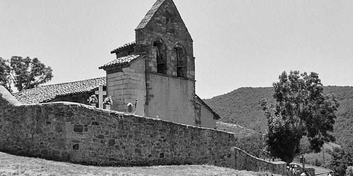 A black-and-white film photo of the village church in Estalaya