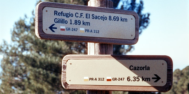 A colour film photo of trail signposts in the Cazorla Natural Park